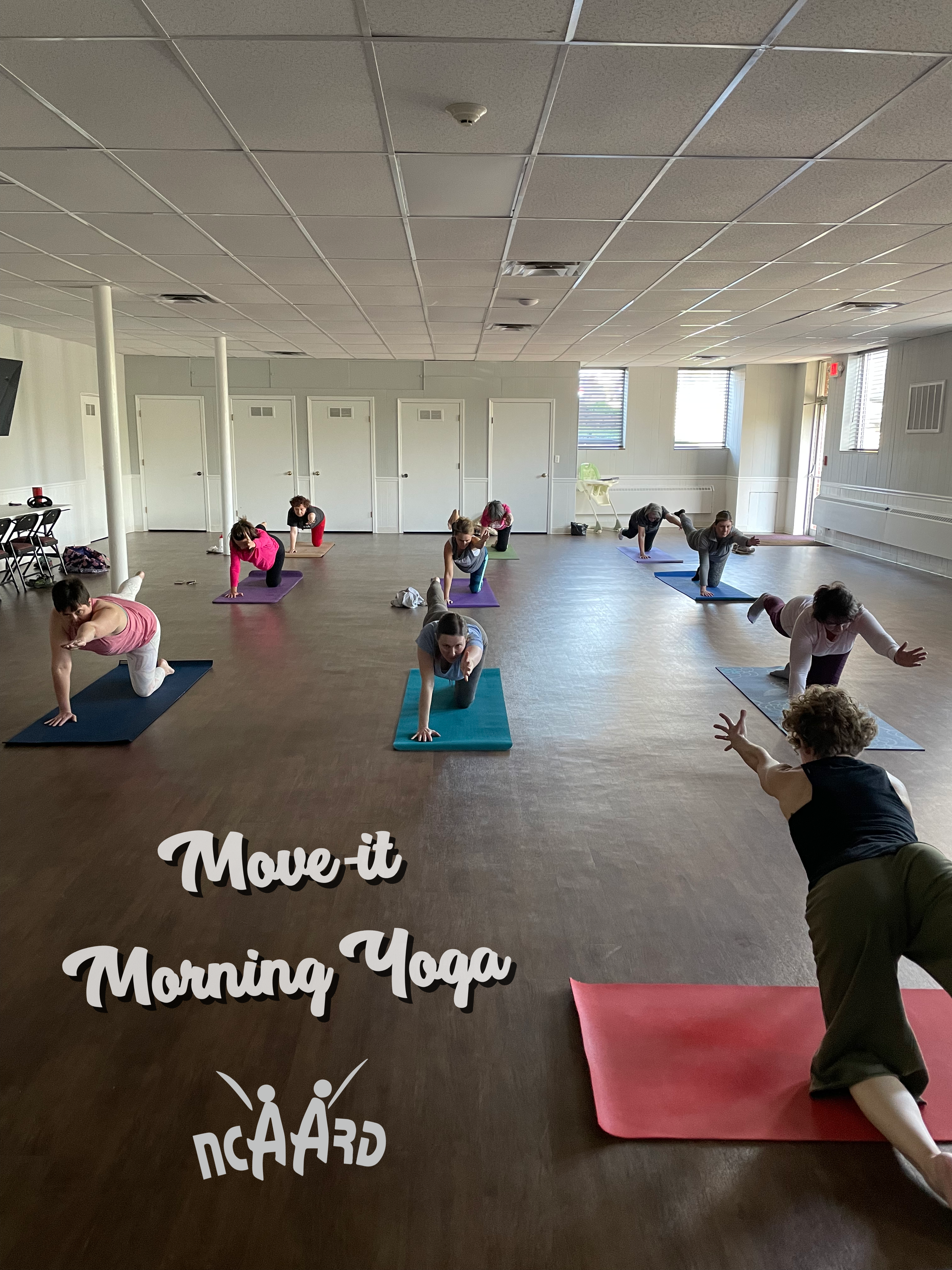 A yoga class with the text 'Move-It Morning Yoga'.